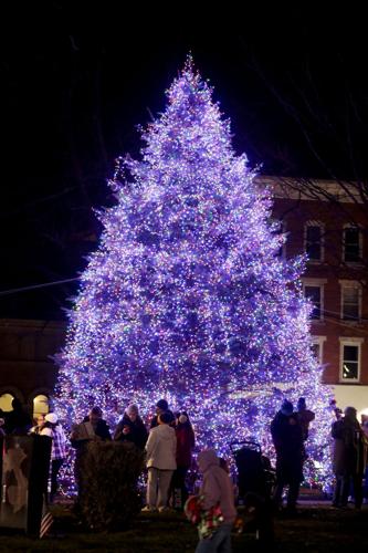 people gather around Pittsfield Christmas tree