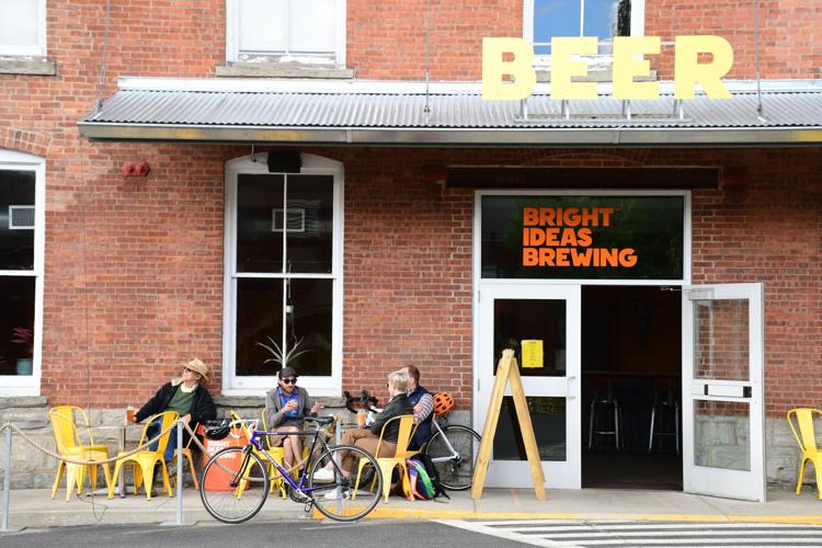 Customers sit outside at Bright Ideas Brewery