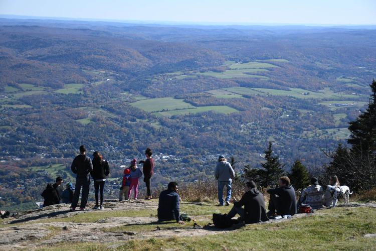 People looks at the view of Adams from the summit (copy)