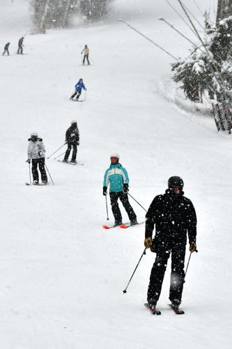 People ski and snowboard at Jiminy Peak