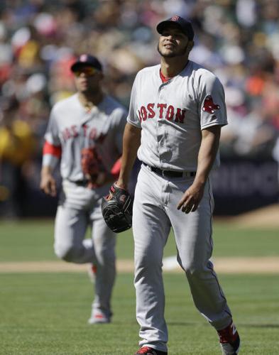 A's get 1st hit on replay reversal in 8th, edge Red Sox 1-0 ...
