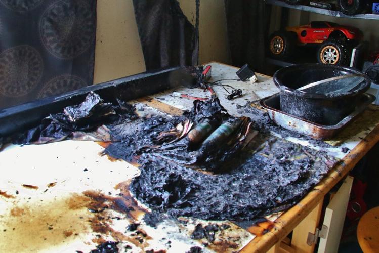 A table with a burned lithium-ion battery