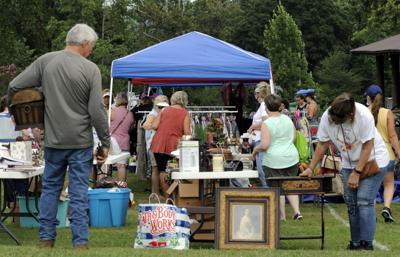 People browse at yard sale