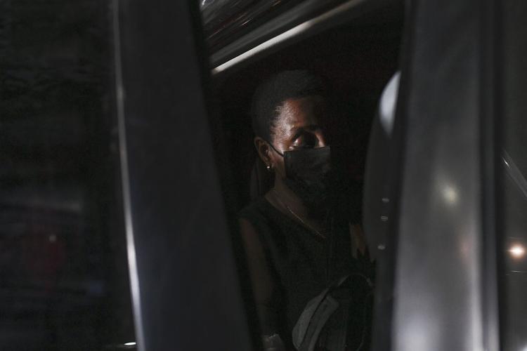Martine Moise sits in a car after a ceremony of remembrance for Haitian President Jovenel Moise