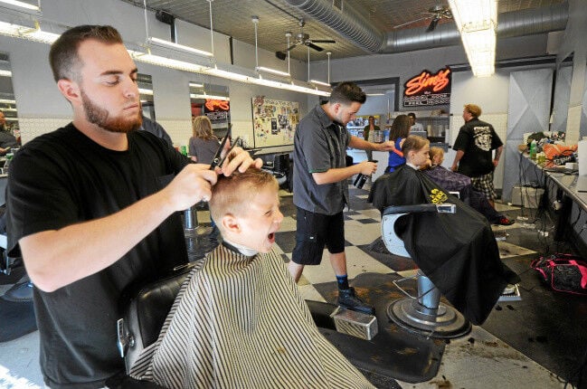 Sim's Barbershops provide free haircuts and styling sessions for that fresh back-to-school look