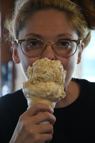 A woman eats ice cream | | berkshireeagle.com