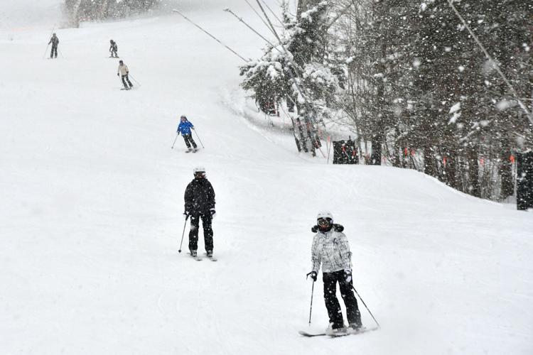 People ski and snowboard at Jiminy Peak