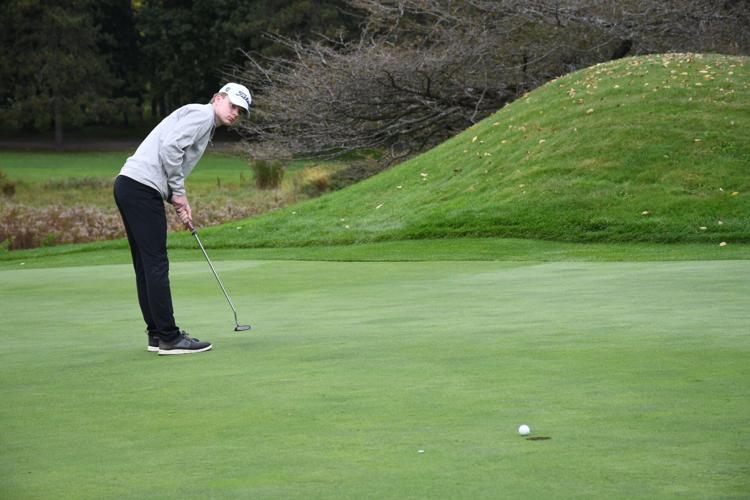 Pat McLaughlin putts it in the 5th hole