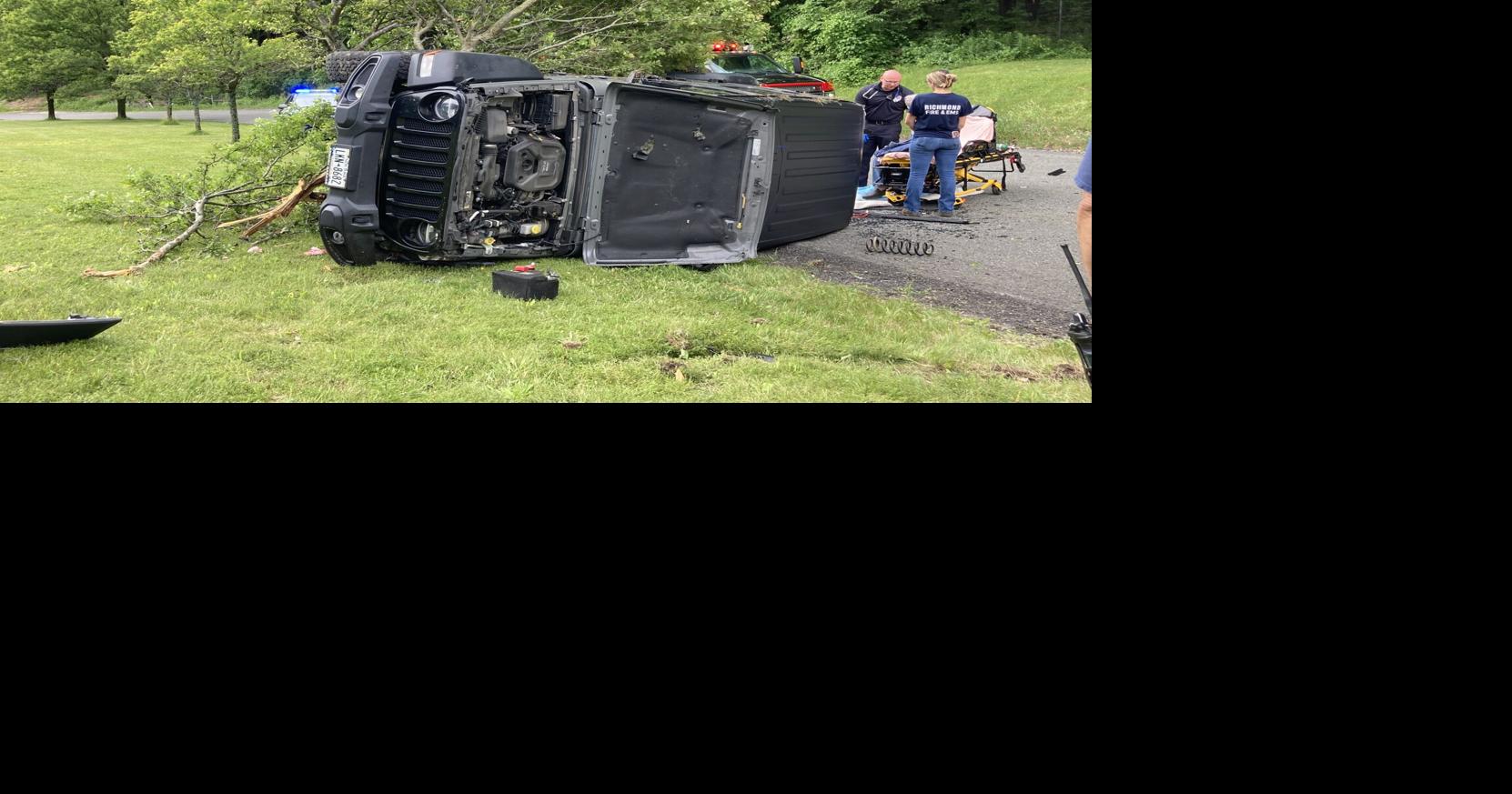 Jeep rolls over after striking tree and signpost in Hancock rest area