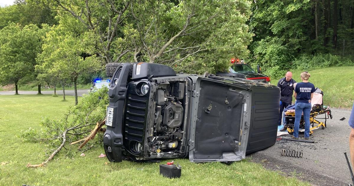 Jeep rolls over after striking tree and signpost in Hancock rest area