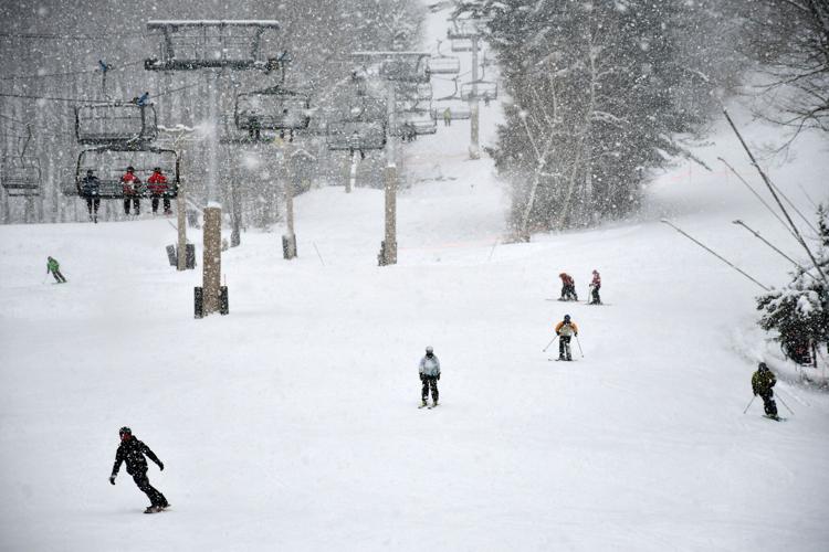 People ski and snowboard at Jiminy Peak