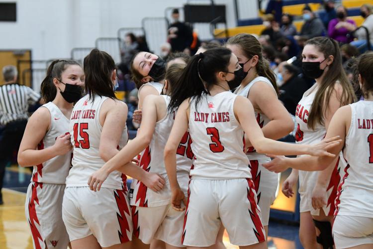 The Hoosac girls basketball team celebrates the win