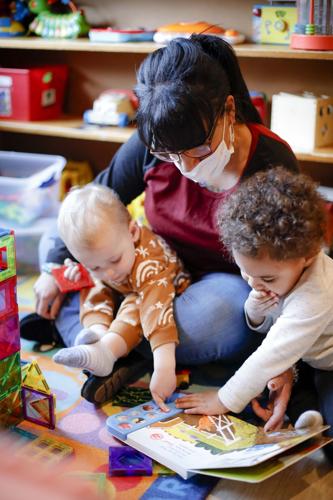 jessica devylder and kids read book at day care (copy)