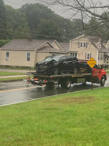 Car that crashed into utility pole on tow truck