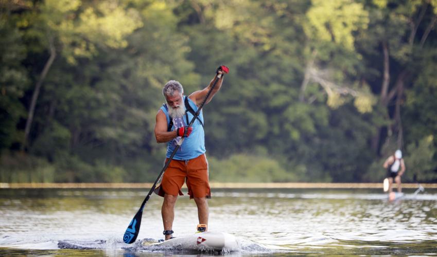 Mike Armstrong paddles on stand up paddle board