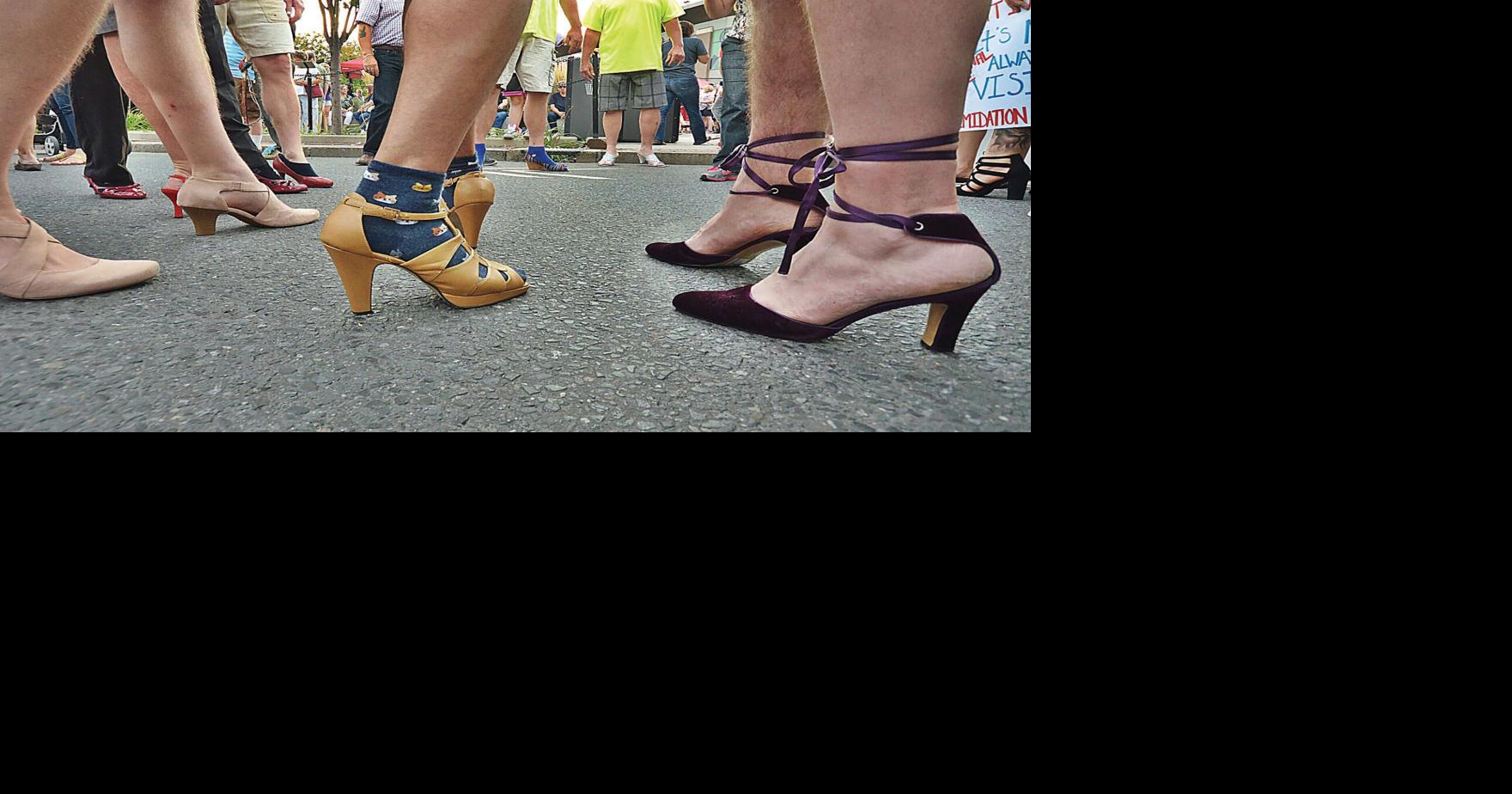 Taking the high (heel) road: 'Walk a Mile in Her Shoes' raises funds for  Freeman Center | Archives 