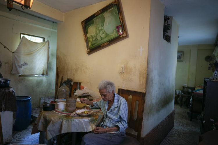 A woman eats lunch alone