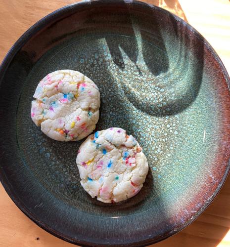 Two sugar cookies on a plate