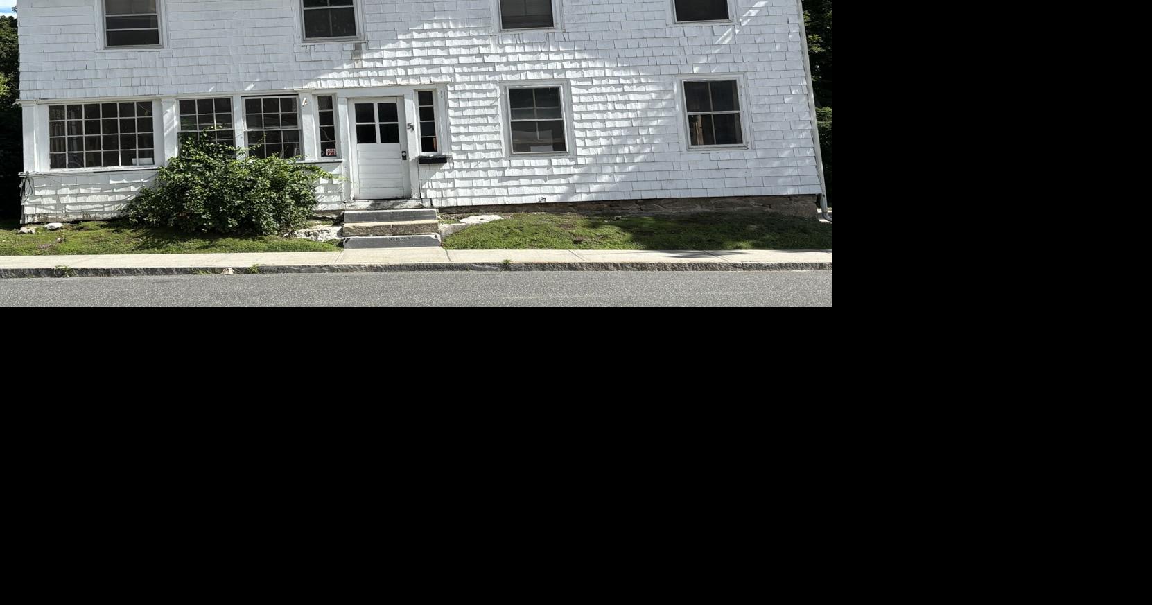 Two downtown Lenox properties sold, raising questions about parking and preservation