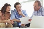 Couple consults with financial planner