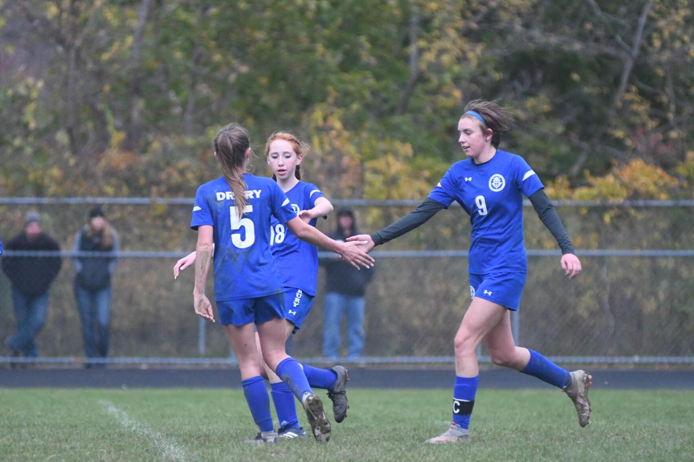 Elli Miles is congratulated for a goal