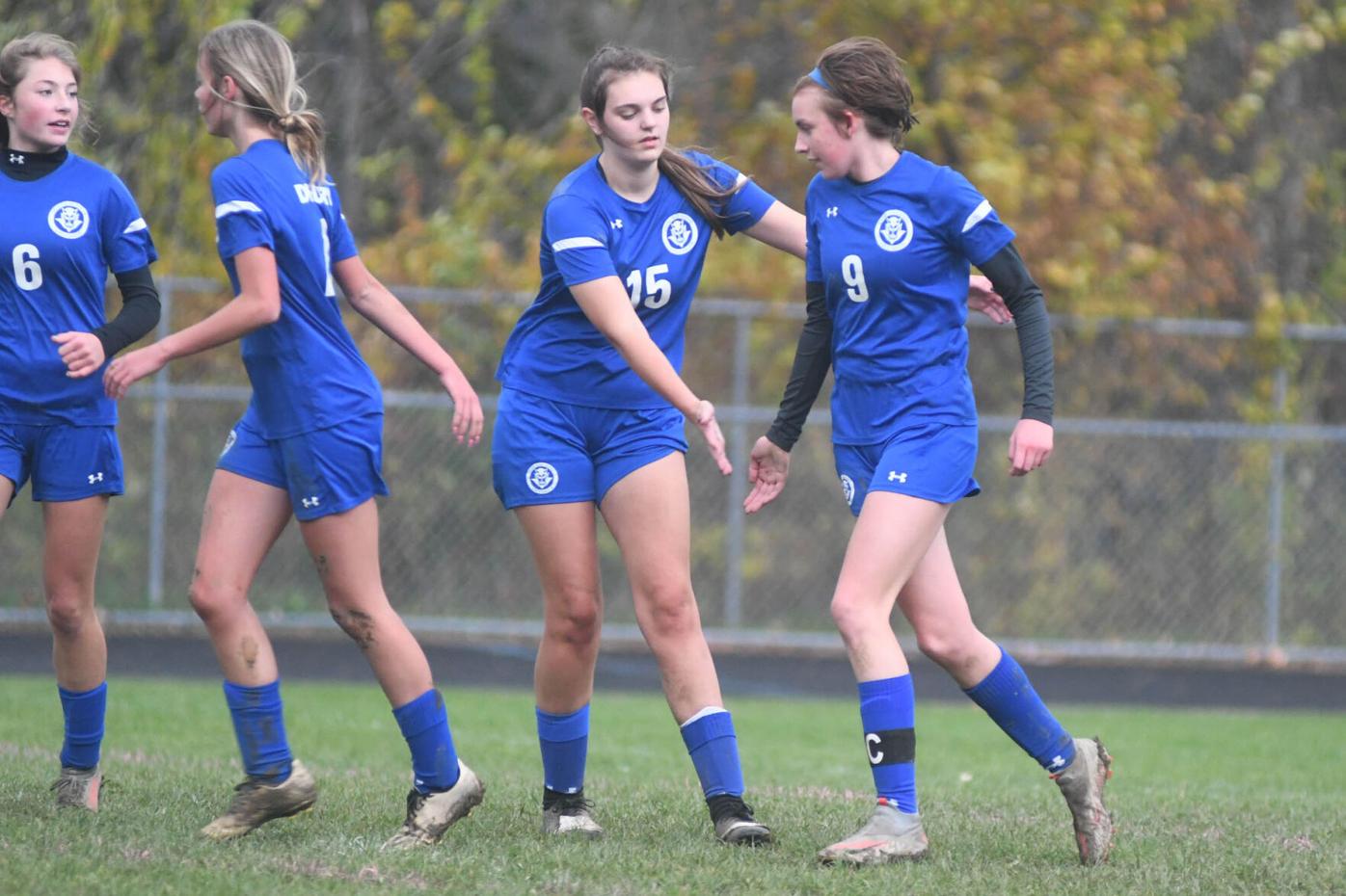 Elli Miles is congratulated on a goal