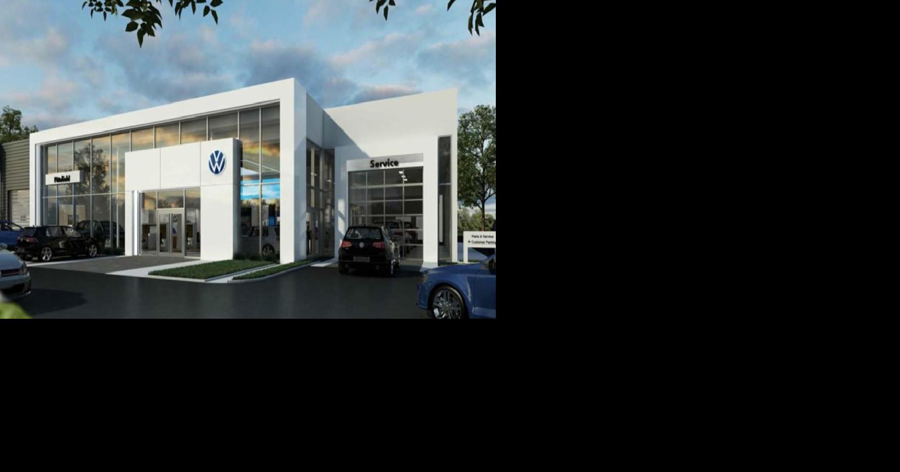 The owner of two auto dealerships has purchased the land to build a new