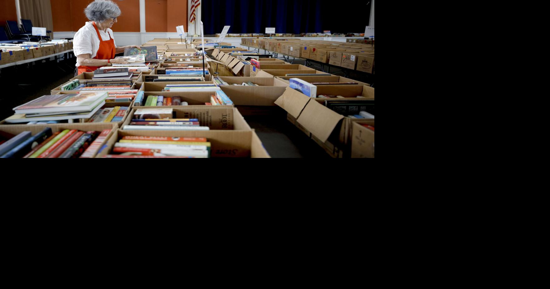 Nancy Cohen setting up for book sale