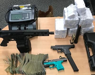 Heroin and guns seized Pittsfield