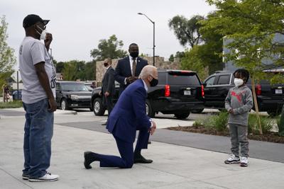 Photo shows Biden with young boy in Detroit, not George ...