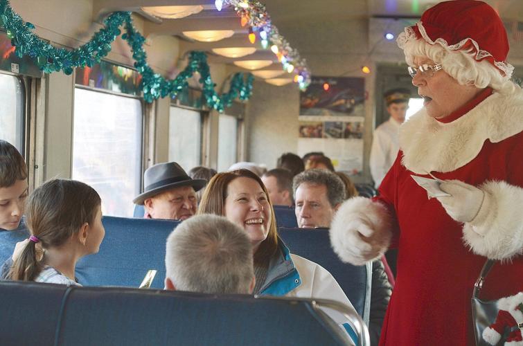 Next stop, Christmas: Families ride the rails with Santa and Mrs. Claus on the Tinseliner