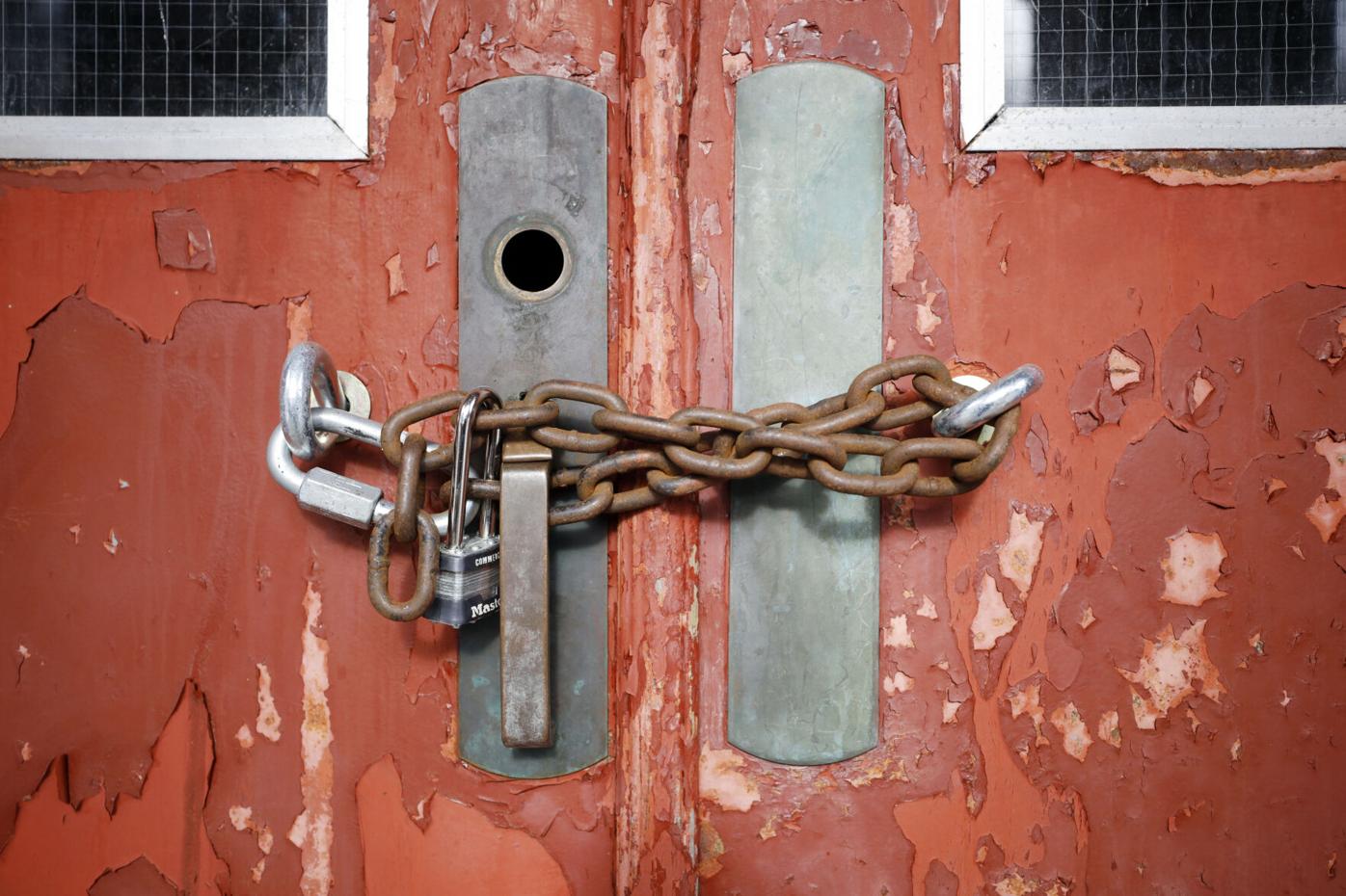 chain and lock on doors of former housatonic school