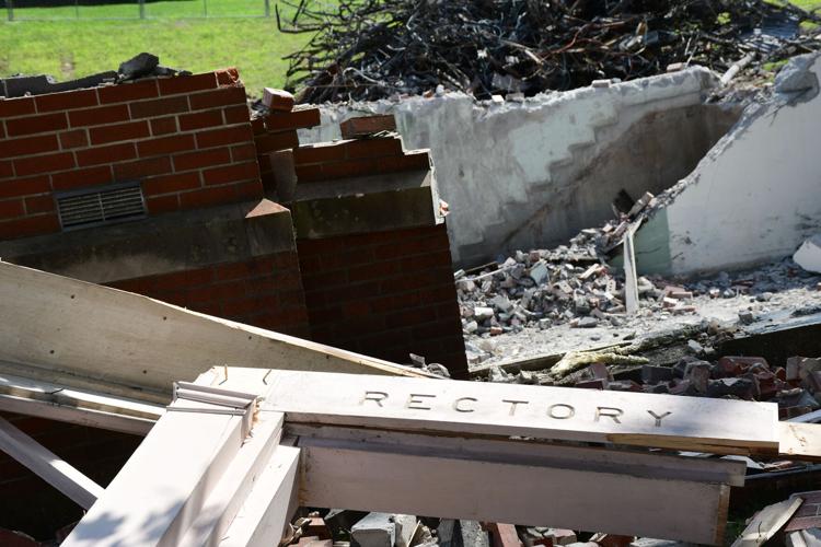 A sign that says Rectory at the demolition site