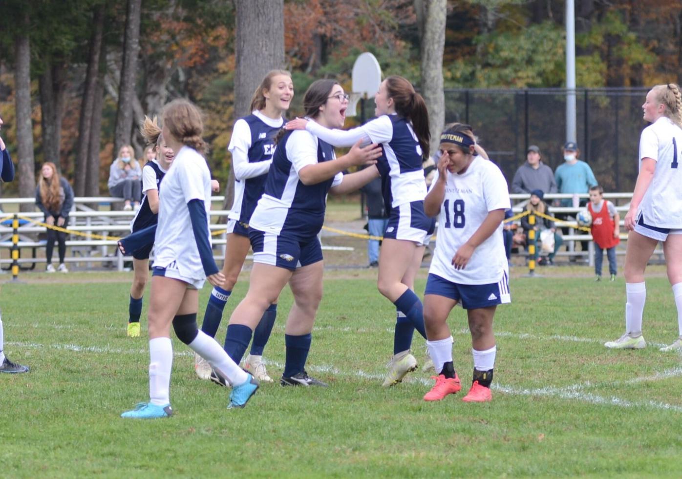 The Eagles celebrate a goal by Megan Loring