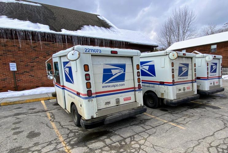 Mail vans parked at the Hinsdale post office