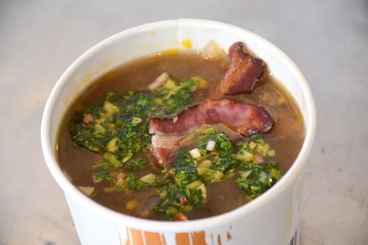 Potato soup with bacon and salsa verde