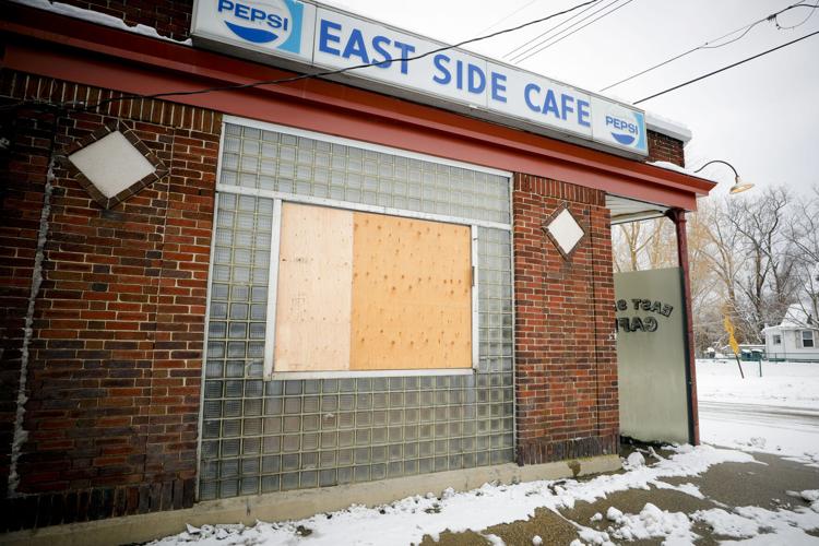 East Side Cafe with boarded window