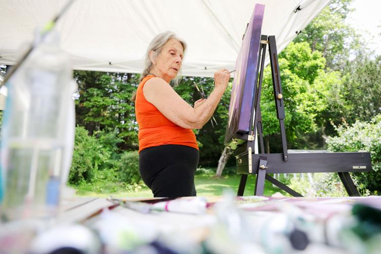 Diane Firtell painting outside