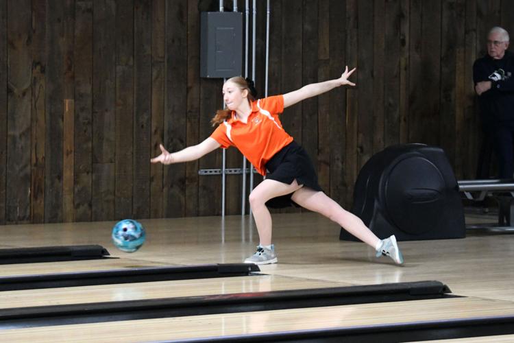 A teen bowls