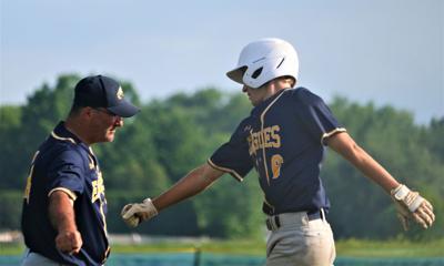 Mount Everett coach and player high five