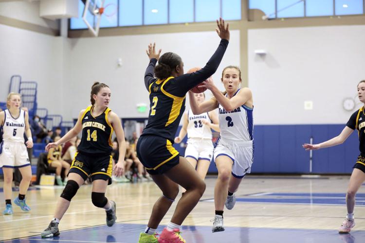 olivia gamberoni steps with basketball in game
