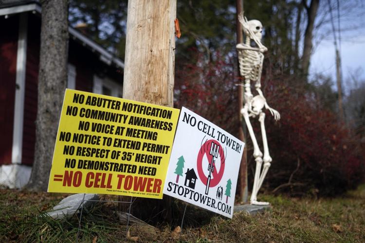 Cell tower protest signs