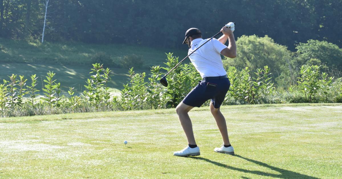Nate Murphy tees off