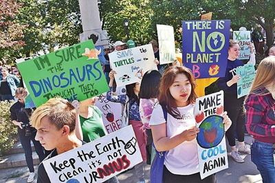 Politics complicate challenge to mitigate climate change amid global protest