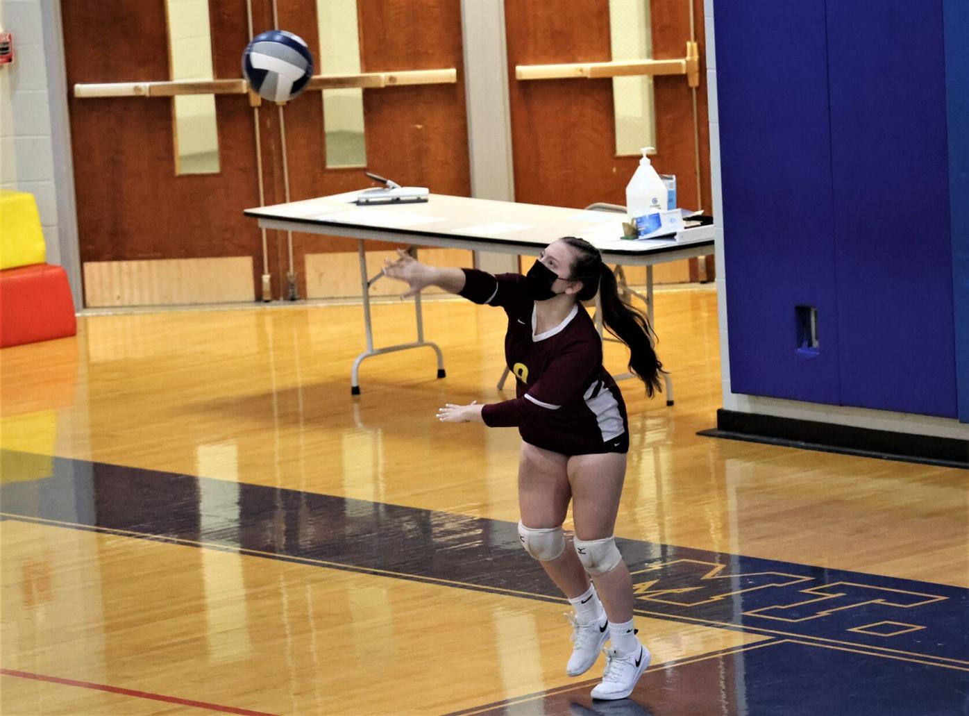 anna nealon serves the ball