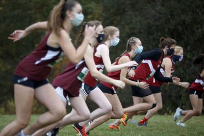 Monument Mountain High students masks runners