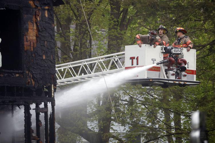 firefighters use ladder truck