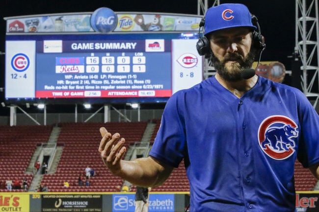 Jake Arrieta reaching new heights, along with his Cubs team