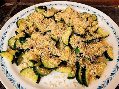 Zucchini with bread crumbs on plate
