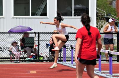 lily boudreau jumps hurdles